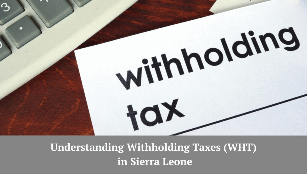Document labeled withholding tax placed on a desk near a keyboard, symbolizing tax compliance in Sierra Leone